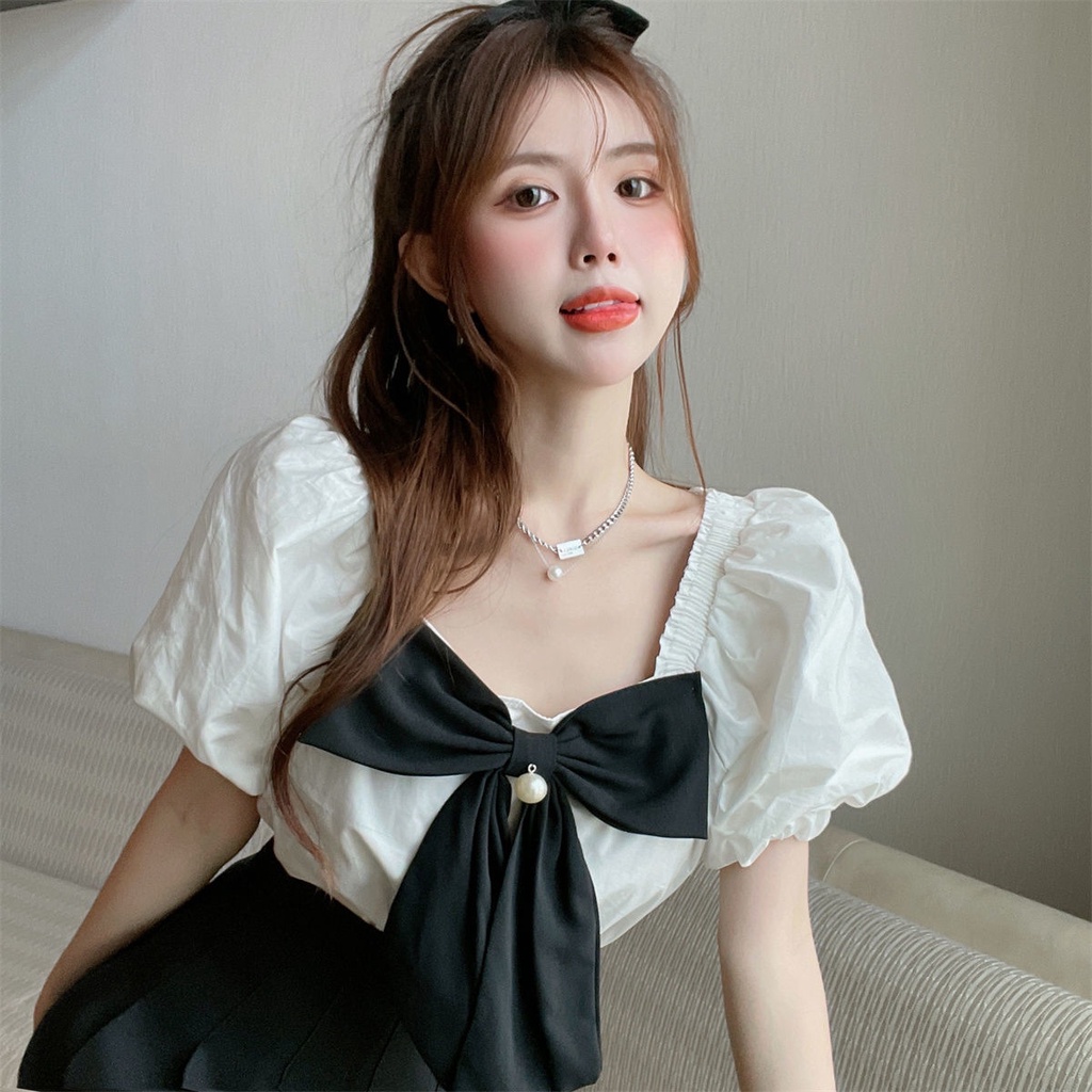 Bộ Áo Sơ Mi Ngắn Tay Đính Nơ + Chân Váy Xếp Ly Lưng Cao Thời Trang OOP023
