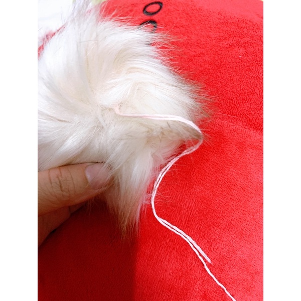 Cục bông gắn chóp mũ