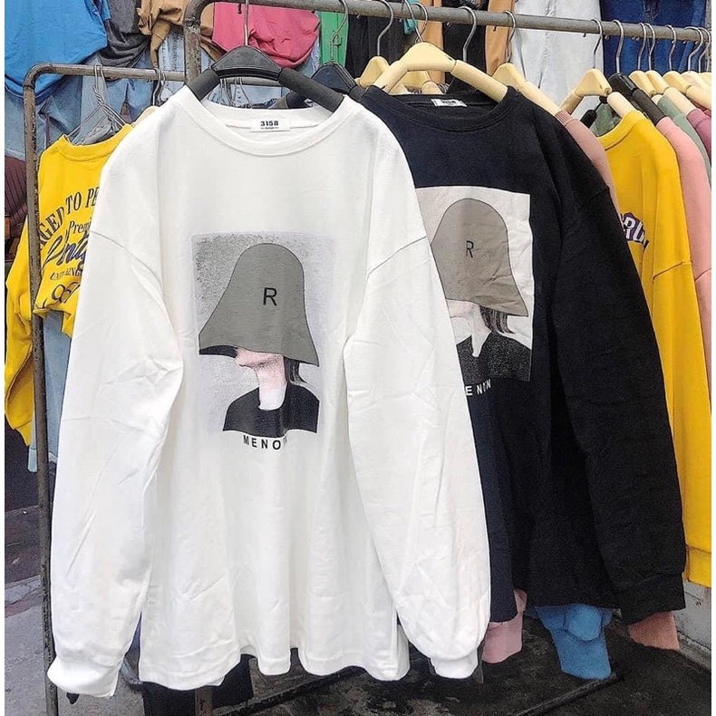 Áo phông dài tay cô gái đội mũ