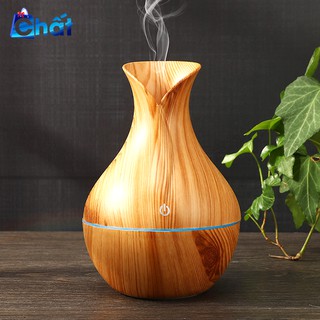 Máy xông tinh dầu vân gỗ có đèn led mẫu hoa tulip