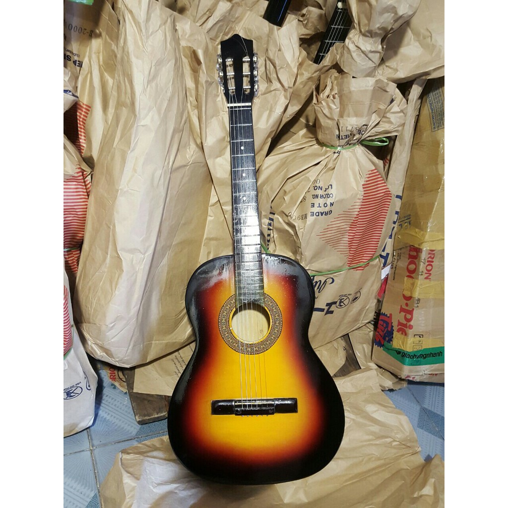 Đàn guitar phổ thông mặt pha đẹp