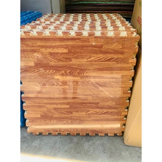 Thảm xốp ghép lót sàn màu vân gỗ, màu đỏ, hình thú kích thước 60*60cm