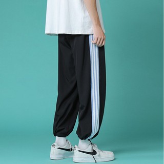 Quần ống rộng ⚡ Video sản phẩm ⚡ Quần Jogger nam nữ, phối 3 sọc là điểm nhấn, dưới gấu có dây rút, chât Umi Thể thao