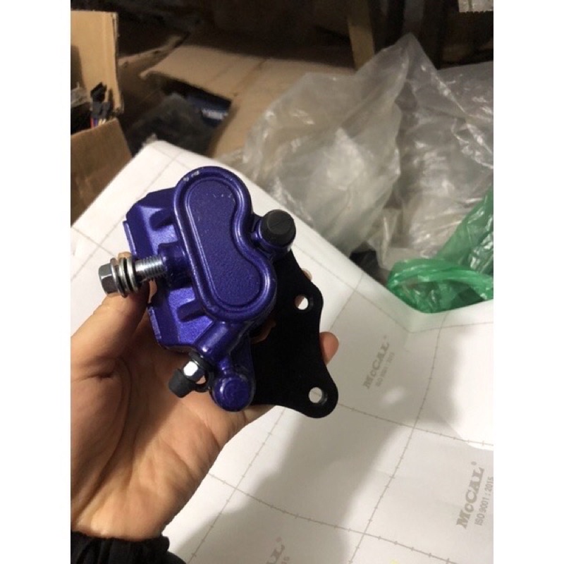 Củ heo dầu dưới xe máy điện 133S