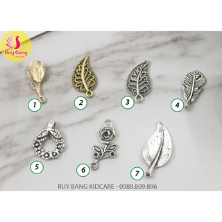 Cành lá kim loại, center đá đính hoa vải handmade