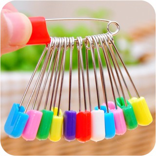 Ghim băng bao đầu nhựa an toàn cho trẻ em
