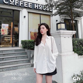 Áo sơ mi trắng vạt bầu xẻ thụng cá tính