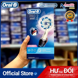 Bàn chải đánh răng điện tự động Oral B Pro 2000 trắng làm sạch răng, hạn chế viêm nướu