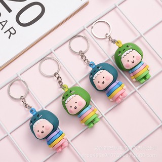 Móc khóa cậu bé mặc áo cosplay xanh