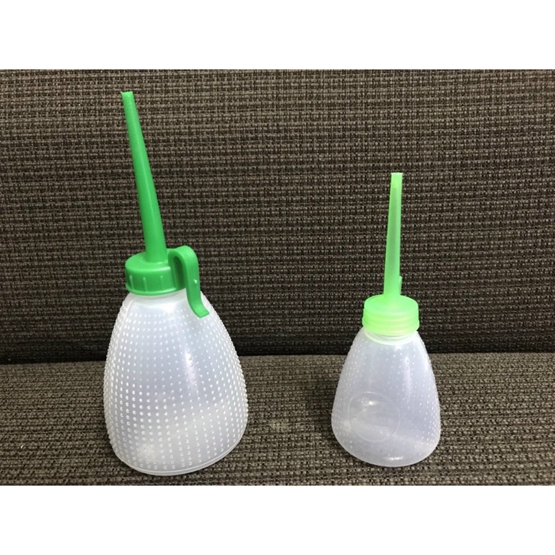 Bình vịt dầu ( đựng dầu máy may)