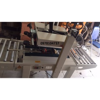 Máy dán thùng, máy dán thùng cattong, máy dán thùng giấy, máy dán băng keo hai mặt thùng carton, máy dán thùng FXA-6050