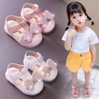 Sandal tập đi chống vấp cho bé - dép cho bé gái nơ đã lấp lánh da mềm có quai dán ôm chân, đế PU mềm 2052 ( ảnh thật)
