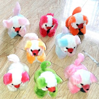Một chú chó nhồi bông nhà làm rất đẹp kích thước dài 8cm x cao 8cm x rộng 6cm