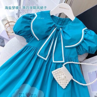 Váy xanh dương viền trắng bé gái