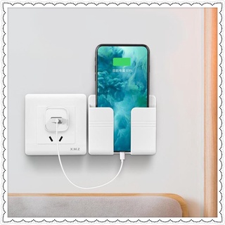 Giá đỡ điện thoại tiện dụng dán tường gần ổ điện bằng nhựa