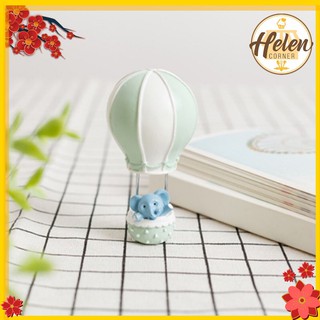 Tượng sứ trang trí bánh kem, mẫu voi xanh ngồi khinh khí cầu