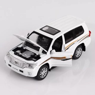 XE LAND CRUISER xe mô hinh Kim Loại, chạy cót có âm nhạc 15*7*6cm