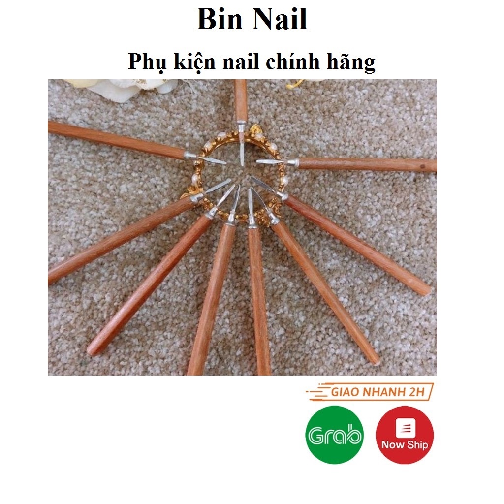 cây lấy khóe móng cán gỗ