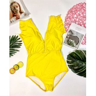 Đồ bơi xẻ ngực cánh tiên vàng