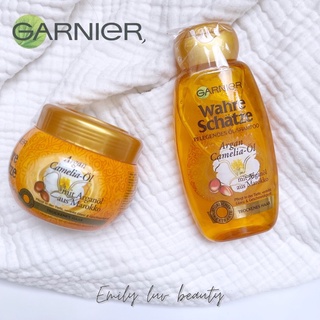 Dầu gội và ủ phục hồi tóc Garnier Argan Oil và hoa trà 250ml bản Đức