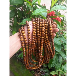 chuỗi hạt tròn 10 ly ( 1 cm ) 108 hạt vòng cổ , tay bằng gỗ màu vàng xen kẽ đen hương thơm tự nhiên