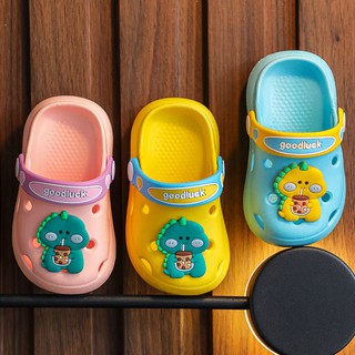 Giày sục cao su mềm tặng kèm sticker cho bé trai và bé gái hình khủng long
