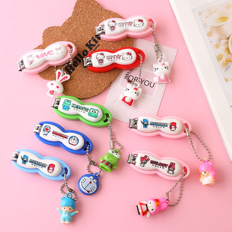 Bấm móng tay Hello Kitty - Doremon Doraemon