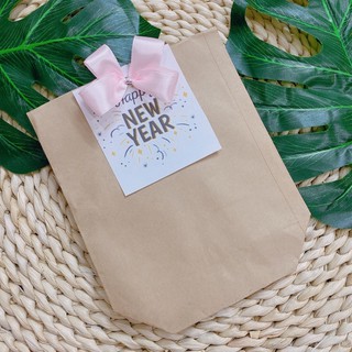 túi giấy đựng mỹ phẩm tặng kèm nơ