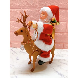 Ông già Noel cưỡi tuần lộc mẫu lớn