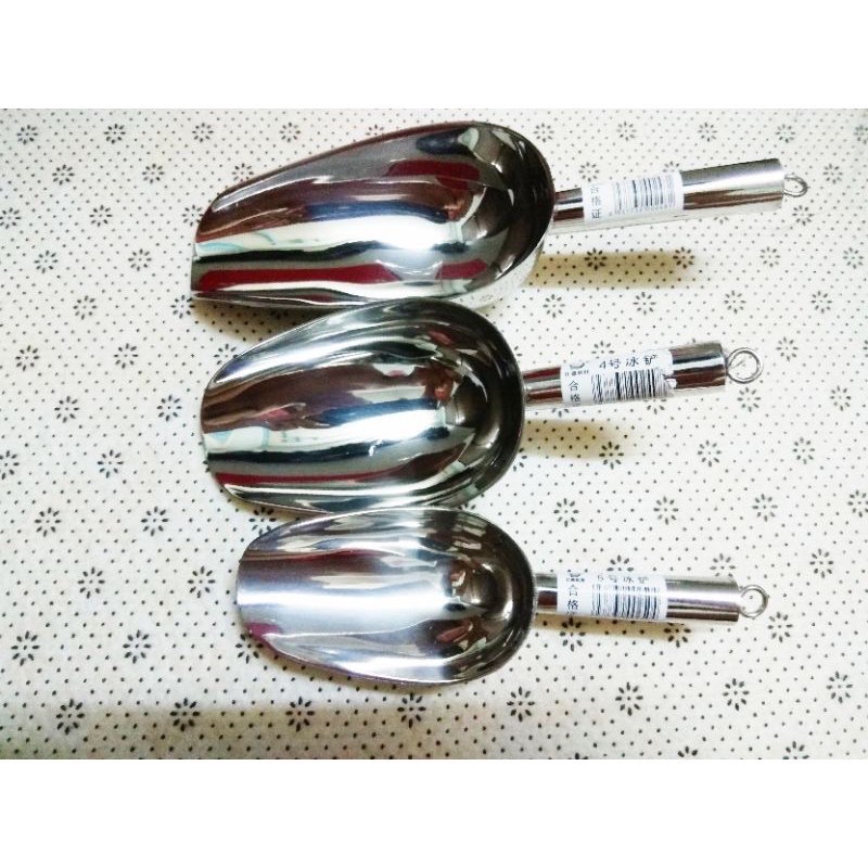 xúc đá inox