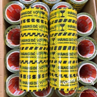Băng Keo In Chữ Cảnh Báo Hàng Dễ Vỡ cọc 6 cuộn nặng 1,2kg màu vàng đen lõi giấy mỏng TuiGoiHangHoanMypro
