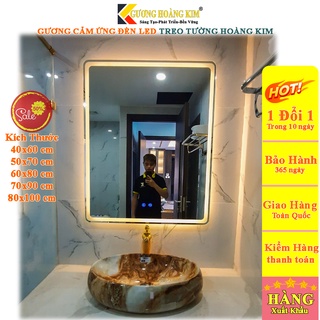 Gương nhà tắm cảm ứng đèn led thông minh treo tường chữ nhật trang điểm kích thước 40x60cm guonghoangkim mã HK-3001