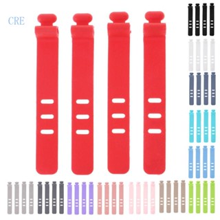Set 4 Phụ Kiện Quấn Dây Cáp Điện Thoại / Tai Nghe Để Bàn Bằng Silicon