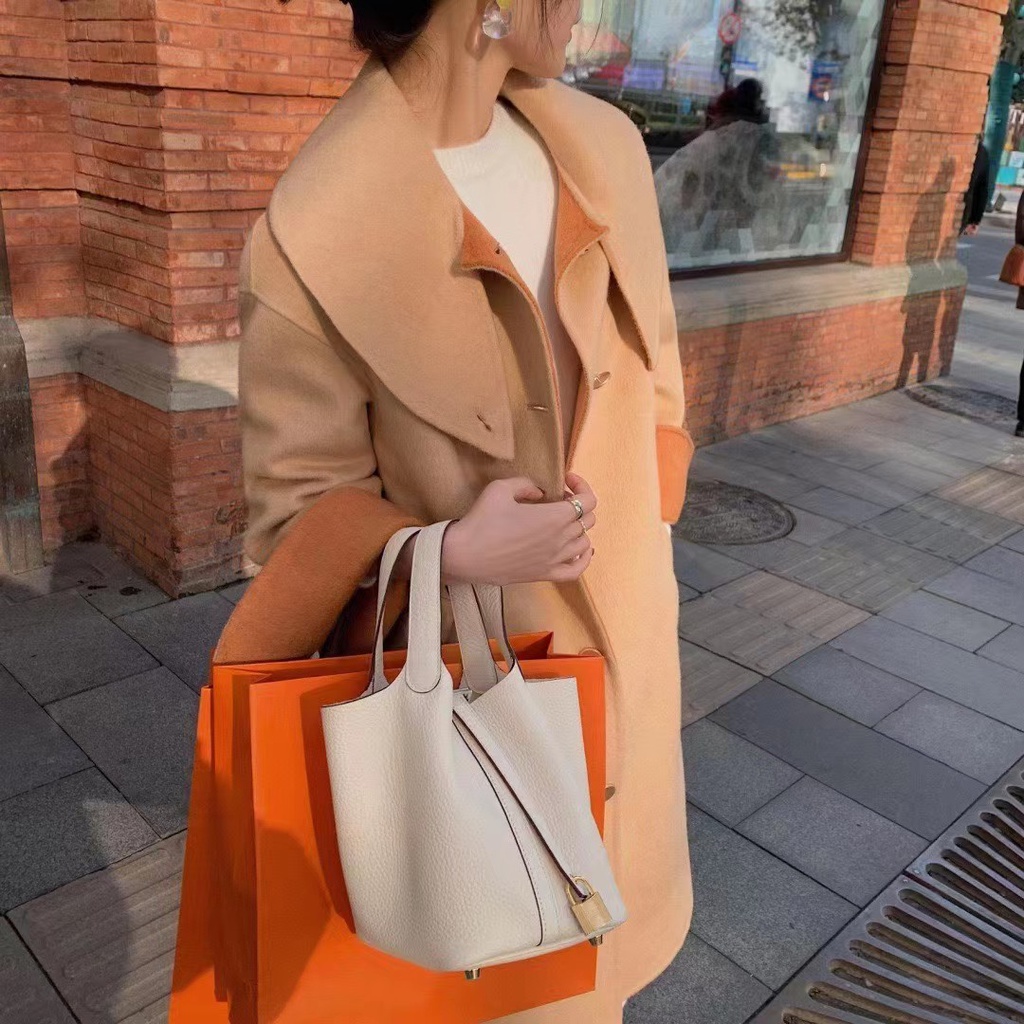 Túi Xách Da Bò Thật Dáng Tròn Nhỏ Dễ Phối Đồ Thời Trang Cho Nữ