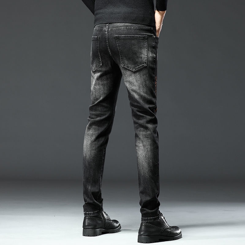 Quần Jean Nam Lưng Thun Ôm Chân Thêu Họa Tiết Phong Cách Châu Âu Thời Trang Xuân Thu Mới