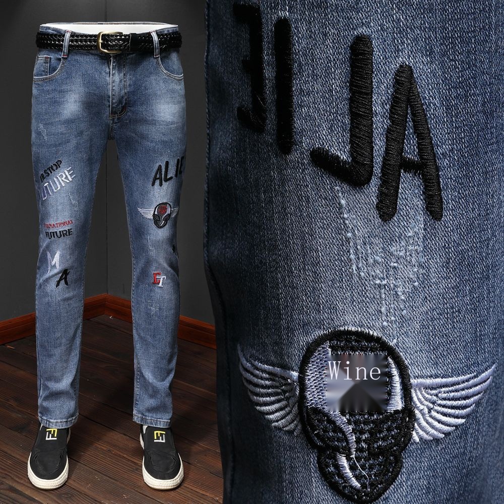 Quần jeans Rách Thêu Hình Rồng plus size 38