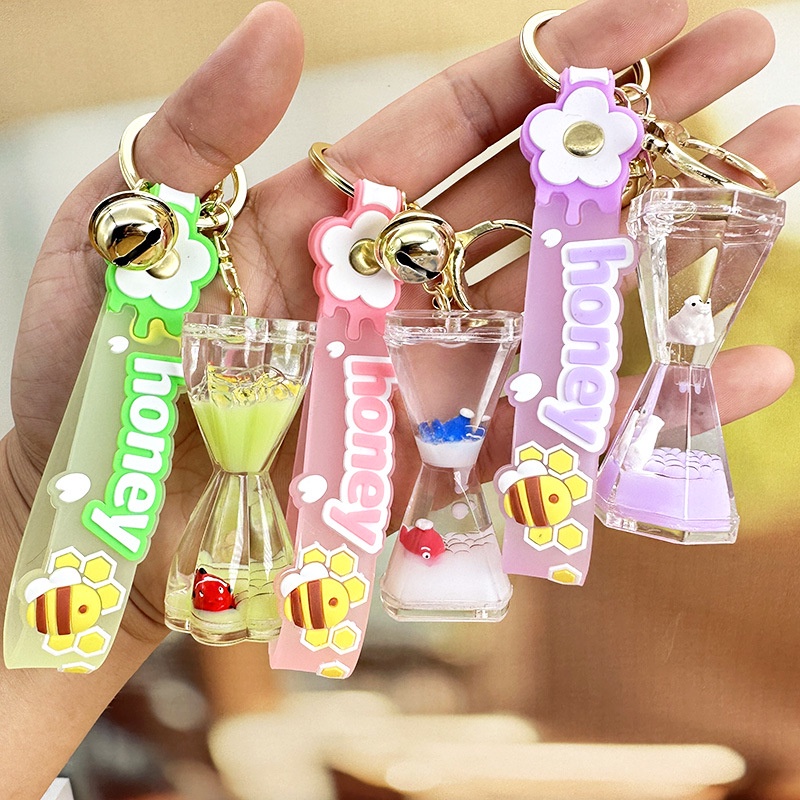 Móc Khóa Đồng Hồ Cát Hình Búp Bê Đại Dương Sáng Tạo