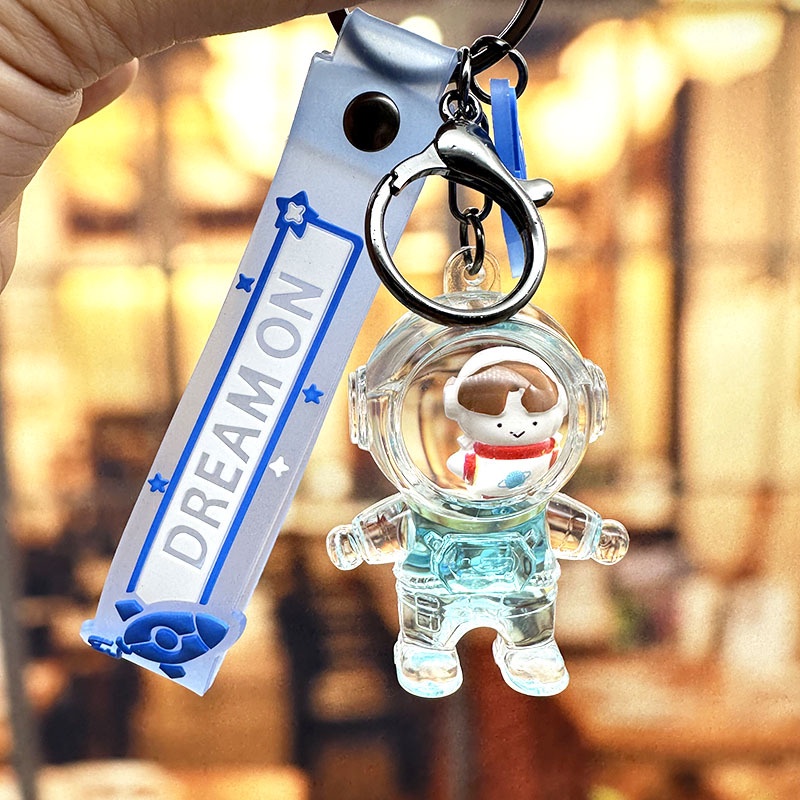 Móc Khóa Hình Chai Nước Phi Hành Gia Trong Suốt Lấp Lánh
