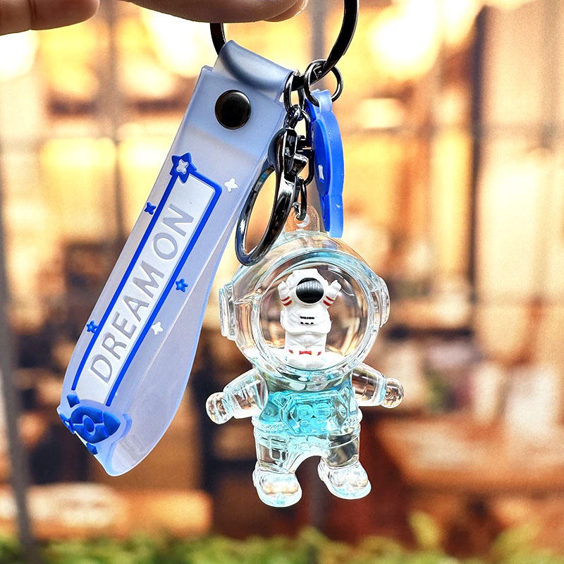 Móc Khóa Hình Chai Nước Phi Hành Gia Trong Suốt Lấp Lánh