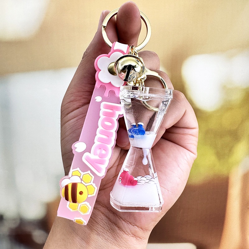Móc Khóa Đồng Hồ Cát Hình Búp Bê Đại Dương Sáng Tạo