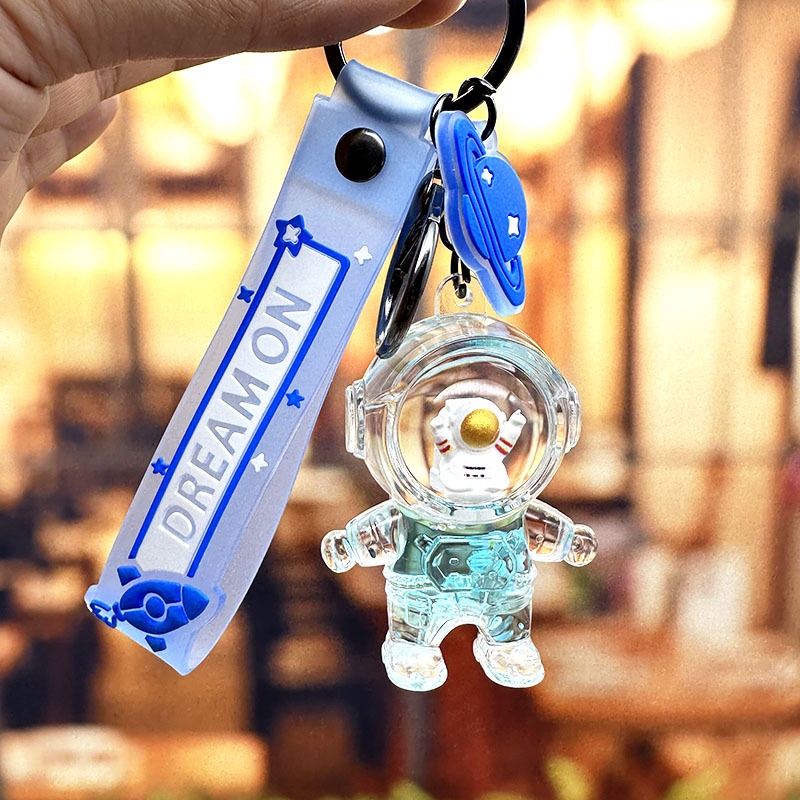 Móc Khóa Hình Chai Nước Phi Hành Gia Trong Suốt Lấp Lánh