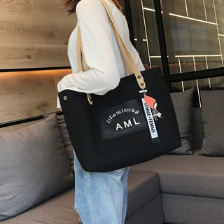 Túi xách nữ vải cao cấp 2 màu trắng-đen vải cao cấp,túi đeo vải cao cấp có chữ life is lucky aml-cuộc sống là may mắn