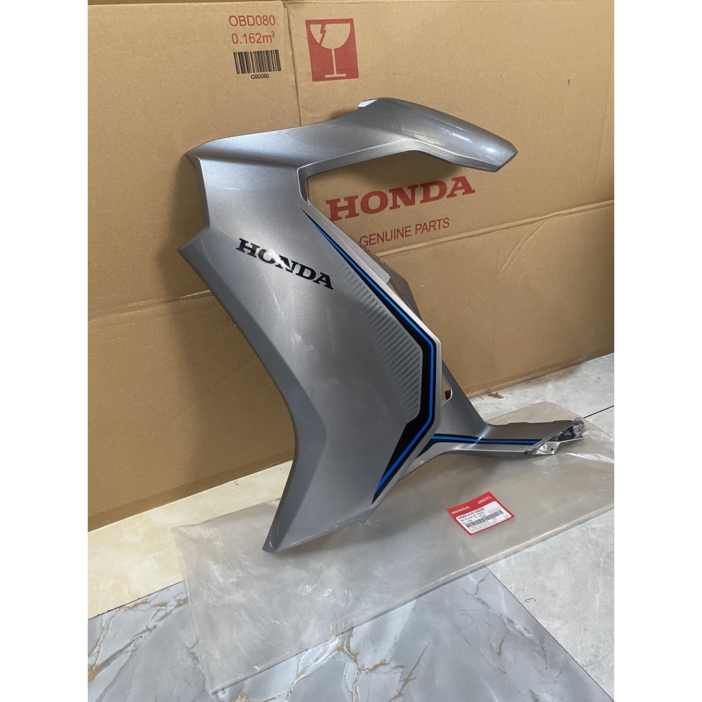 Cánh yếm bên trái - bửng yếm HONDA AIR BLADE 125 năm 2020 màu Bạc xanh đen. 64600K1GV00ZB