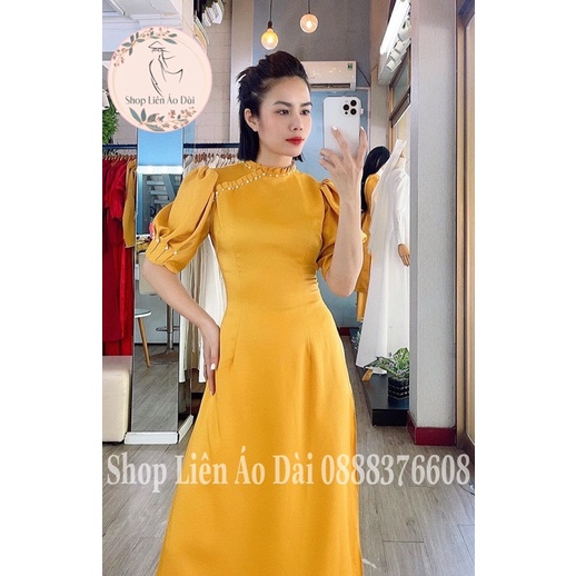 Áo dài cách tân nữ cổ xếp ly tay ngắn bo tay, áo dài thiết kế xếp ly kiểu cách trên phần thân trẻ, áo dài may sẵn