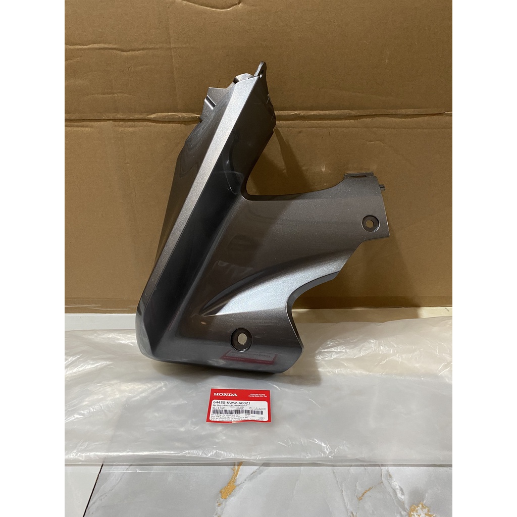 Ốp ống yếm bên trái HONDA WAVE S110 năm 2009-2010 màu Ghi xám. 64450KWWA00ZJ