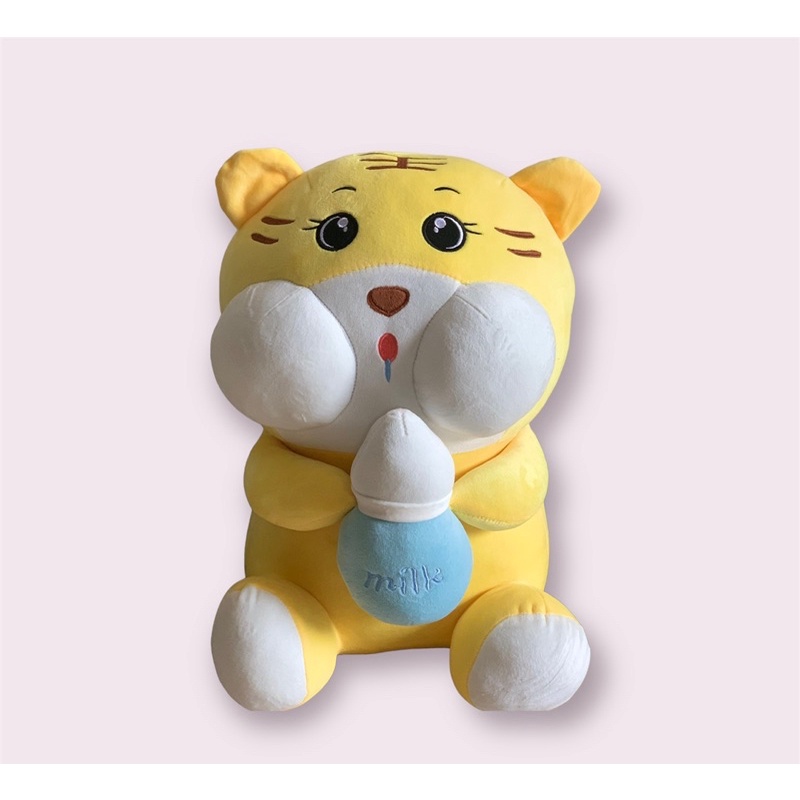 Gấu bông hổ ôm bình sữa