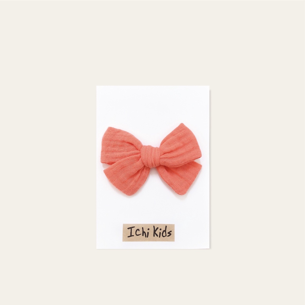 Băng đô hoặc kẹp nơ màu trơn cho bé