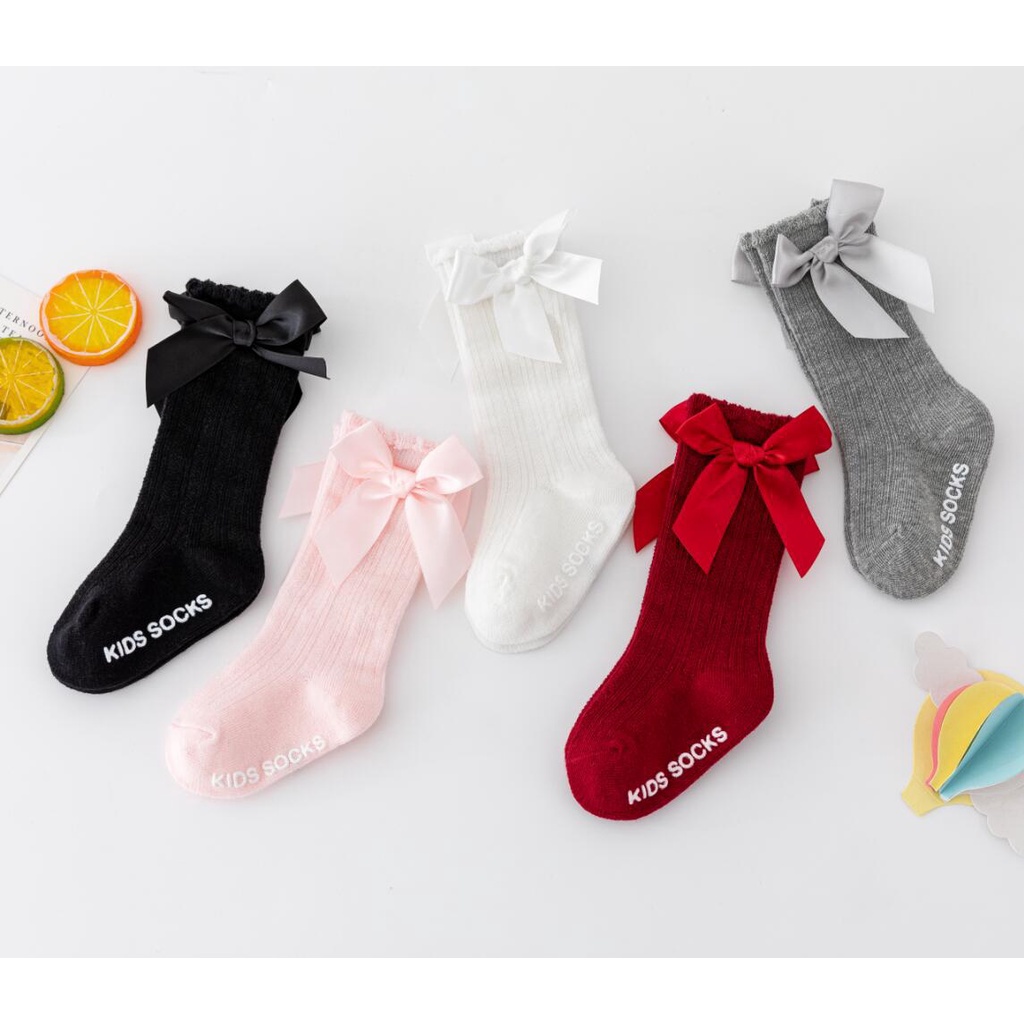 Vớ BCBL vải cotton màu trơn đính nơ chống trượt mới cho bé trai/ bé gái