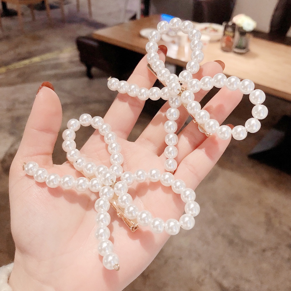 Kẹp tóc nơ đính giả ngọc trai dễ thương dành cho nữ