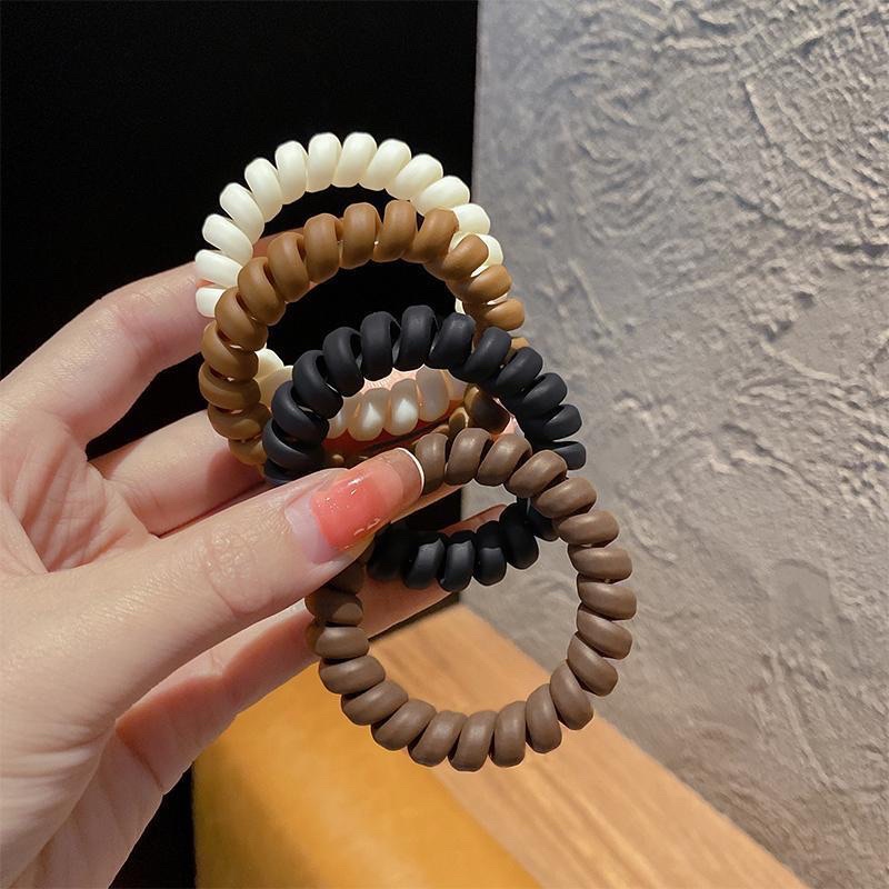 Lò xo cột tóc, chun lò xo màu trà sữa, thun màu đơn giản